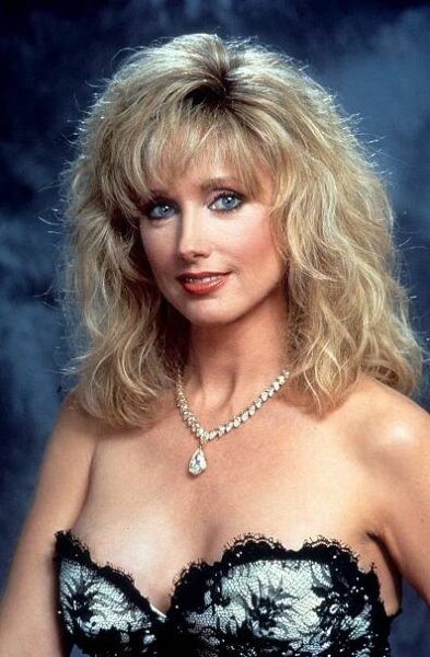 Morgan Fairchild in Bláznivá střela 33 a 1/3: Poslední trapas (1994)