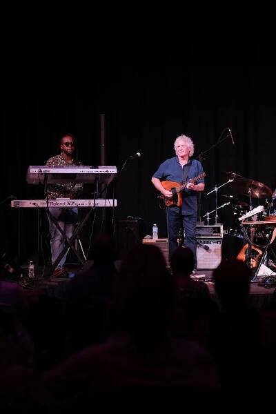 Vertical image of Richy Stano and his keyboard player rocking the Reilly Arts Center in Ocala, fl.