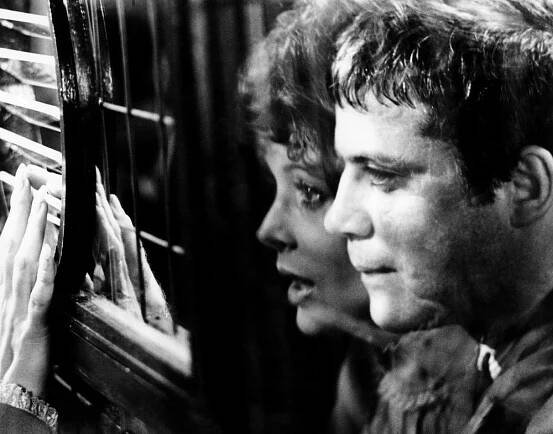 SITTING TARGET, from left: Jill St. John, Oliver Reed, 1972