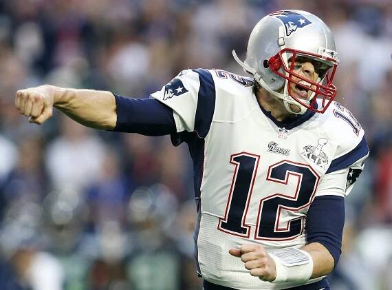 Super Bowl XLIX (2015):  New England's Tom Brady pumps his fist after throwing one of his four touchdown passes in the Patriots' 28-24 victory over Seattle. Brady joined Joe Montana as the only players to win three Super Bowl MVPs.