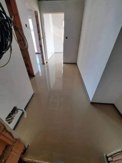 Realizace litých podlah v Polyfunkční dům Harfistka - Praha, Vysočany | Minerva Build s.r.o.