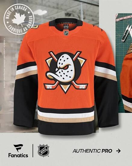 Photo of new 2024–25 Anaheim Ducks Fanatics Authentic Pro home jersey with Made in Canada stamp, Fanatics logo, and NHL logo. Made in Canada with domestic and imported content.