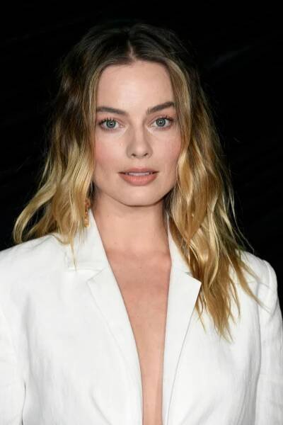 Image may contain Margot Robbie Face Human Person and Home Decor