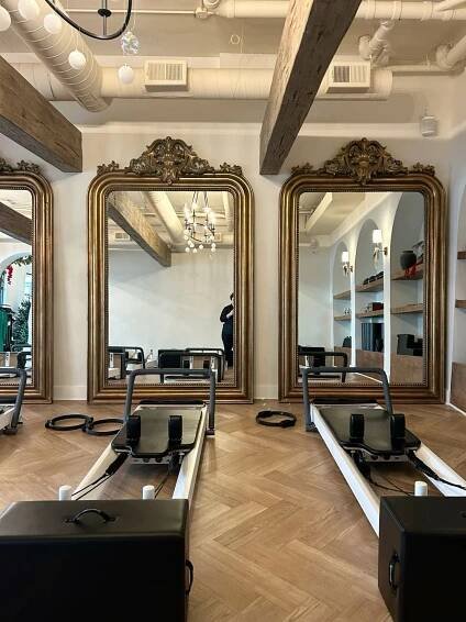 Pin by lindsey houlker on Ss25 🩰🌬️🍿🦢🪐🥡✨🫒 in 2025 | Pilates studio, Yoga studio design, Pilates