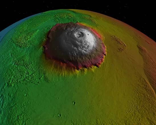 False-colour image showing topography of Olympus Mons, captured by the Mars Global Surveyor mission. Credit: NASA/Goddard Space Flight Center, Scientific Visualization Studio