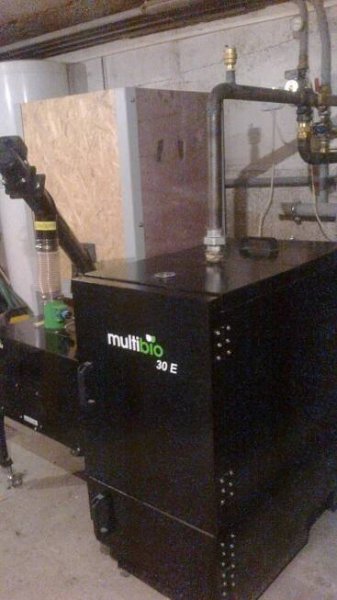 Levné vytápění rodinného domu kotlem MultiBio 30E...	