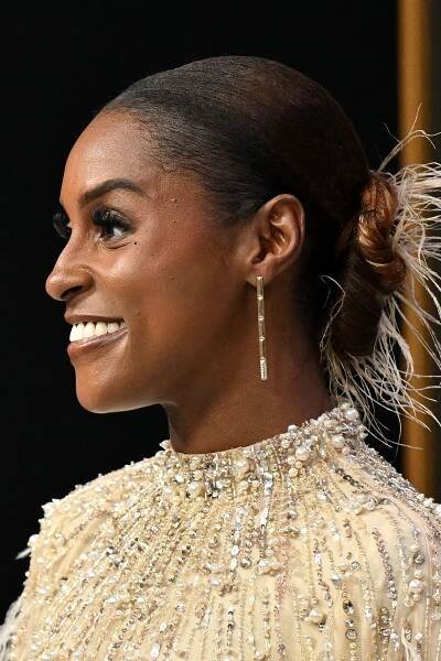 Issa Rae’s Feathered 2023 Emmys Gown Has Me Singing, ‘I’m Like a Bird’