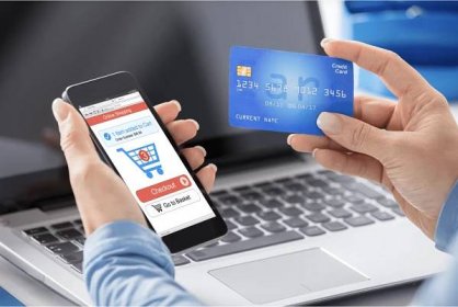 Picture showing a customer performing a card-not-present transaction through his phone. 