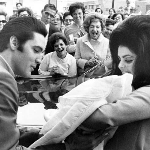 1024px-Elvis_Presley_and_Priscilla_with_Lisa_Marie_February_1968