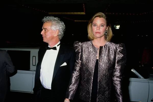 American television producer Bernard Sofronski, wearing a tuxedo and bow tie, with is wife, American actress Susan Dey, who wears a black-and-silver patterned jacket, attend the 46th Golden Globe Awards, held at the Beverly Hilton Hotel in Beverly Hills, California, 28th January 1989.