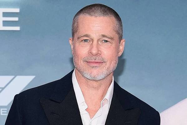 Brad Pitt Reveals the Reason Behind His New Buzzcut as He Teases New Role (Exclusive)
