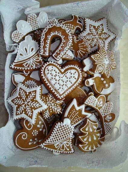 some very pretty decorated cookies in a box