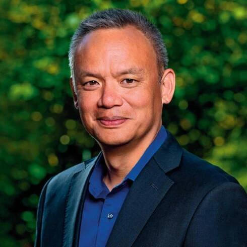 Edward Wong in suit jacket and dress shirt