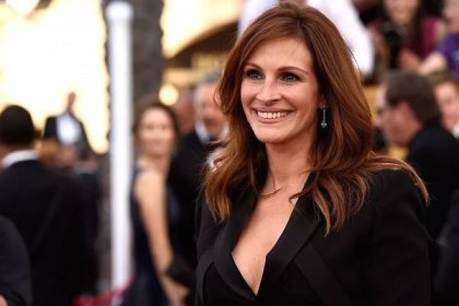 This image may contain Julia Roberts Human Person Clothing Apparel Sleeve Face Coat Fashion and Premiere