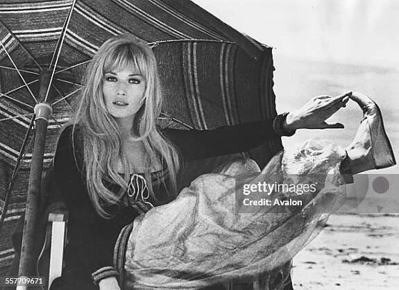 Actress Monica Vitti relaxing under a parasol as she film scenes for 'The Chastity Belt', August 8th 1968.