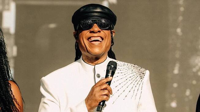 Stevie Wonder, 75, cracks blind joke as he pays tribute to John Lennon