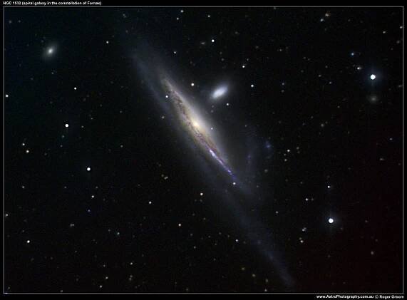 NGC 1532 (galaxy in the constellation of Fornax). 22 x 300s clear + 30 x 180s blue + 30 x 180s green + 30 x 180s red. ST8-XME, 12" SCT @ ~2200mm (0.84"/pixel).