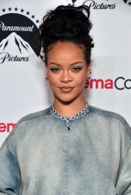 Rihanna posing for photos.