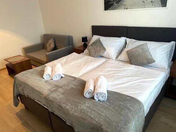 Postel nebo postele na pokoji v ubytování Hotel U Ševce