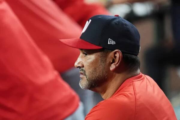 An image collage containing 1 images, Image 1 shows Washington Nationals manager Dave Martinez watching a baseball game