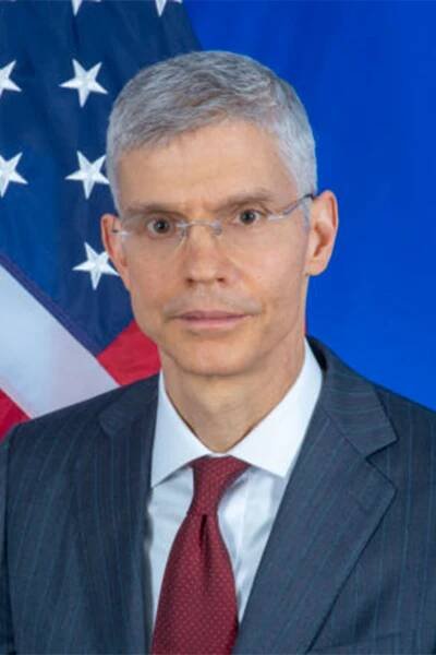 John Mark Pommersheim, Ambassador of the United States to Tajikistan, was threatened by Congressman Mullin.