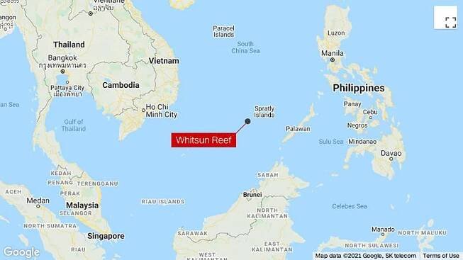 Philippines demands Chinese fishing flotilla leave disputed South China Sea reef