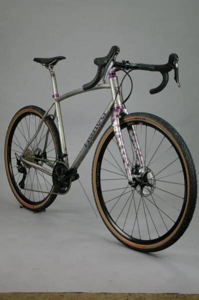 Adventure ready. Curved top tube, crisp anodized highlights. 