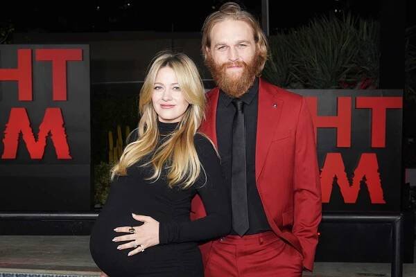 Wyatt Russell's Pregnant Wife Meredith Hagner Cradles Baby Bump at Night Swim Premiere