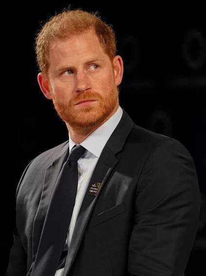 Prince Harry in a suit.