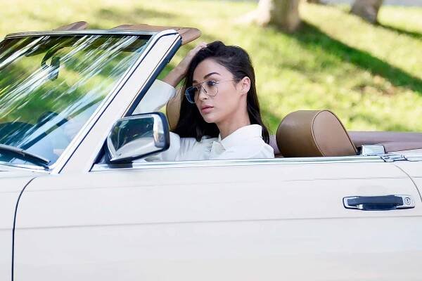 Cara Santana rocks a vintage Celine dress to match her Classic Mercedes!