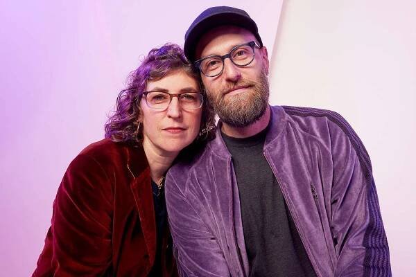 Mayim Bialik and Jonathan Cohen visit the IMDb Portrait Studio at SXSW 2024 on March 09, 2024 in Austin, Texas. 