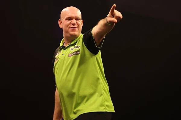 Michael van Gerwen celebrating a darts victory.