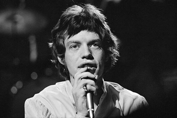 English singer Mick Jagger of The Rolling Stones during a performance by the band on the set of the Associated Rediffusion Television pop music television show Ready Steady Go! at Wembley Television Studios in London on 7th October 1966. The group would perform three tracks on this edition of the show, 'Have You Seen Your Mother, Baby, Standing in the Shadow?', 'Lady Jane' and 'Paint It Black'. (Photo by Ivan Keeman/Redferns)