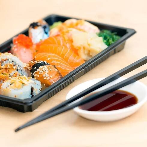 Image of sushi set packed for delivery
