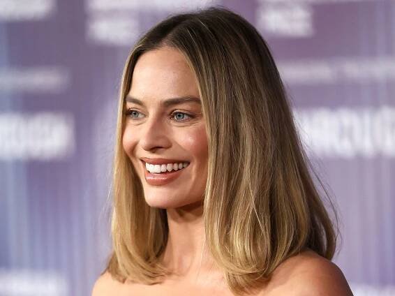 Margot Robbie just made a nightgown and shower shoes look impossibly chic