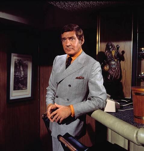 A stylish image of Anthony Franciosa dressed in an elegant suit, looking thoughtful from the movie 'The Name of the Game', 1968.