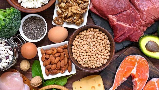 High protein food - fish, meat, poultry, nuts, eggs and vegetables. healthy eating and diet concept