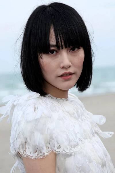 rinko kikuchi with long bangs