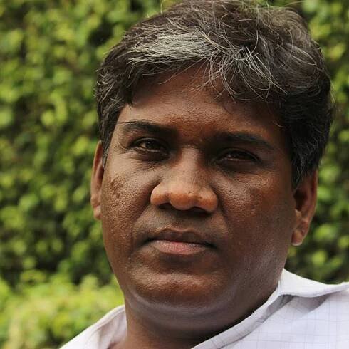 Indian filmmaker arrested for tweeting photo of home minister with official accused of corruption