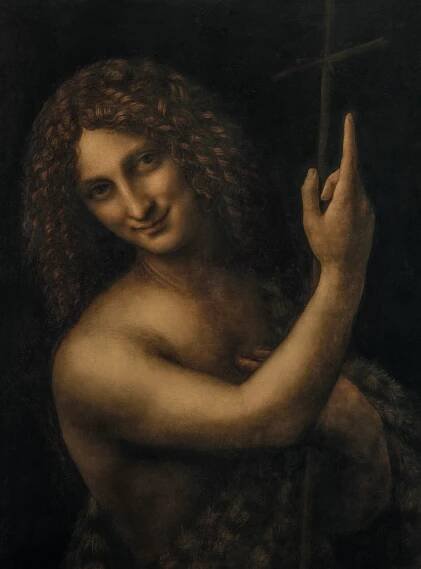 Leonardo da Vinci’s Saint John the Baptist painting featuring a half-length portrait of a curly-haired figure in chiaroscuro, holding a cross and pointing upward, Louvre Museum.