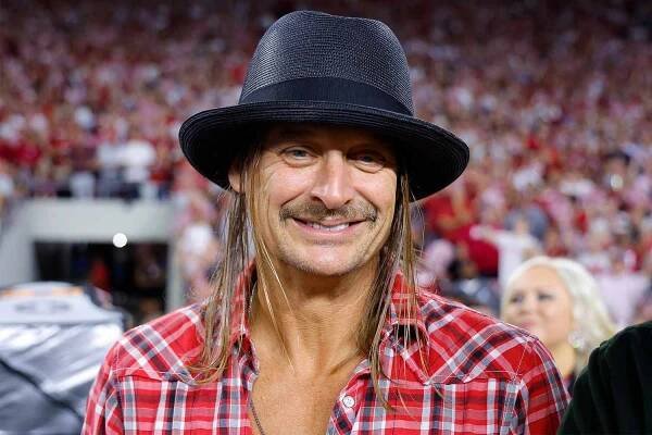 Kid Rock smiles on the sideline of the game between the Georgia Bulldogs and Alabama Crimson Tide at Bryant-Denny Stadium on September 28, 2024 in Tuscaloosa, Alabama. 