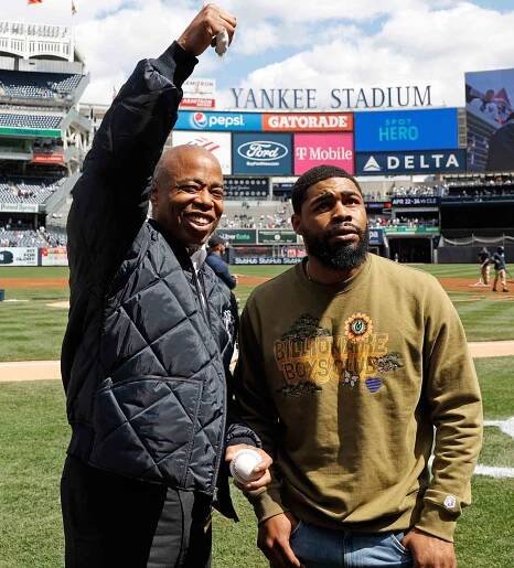 New York City Mayor Eric Adams (L) gesture while on the field with his son Jordan Coleman (R) before the MLB baseball game between the Boston Red Sox and the New York Yankees on Opening Day at Yankee Stadium in the Bronx, New York, USA, 08 April 2022.