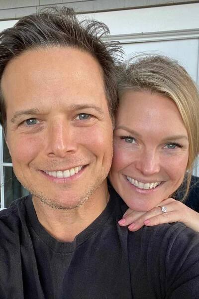 Scott and Kelley Wolf pose for a photo together in May 2024.