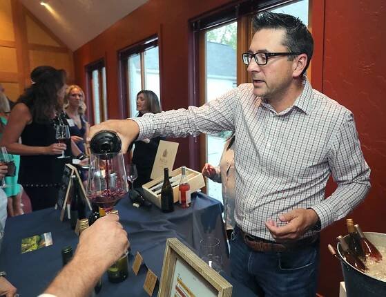 Ben Curtis guest bartending at a Celebrity Guest Bartending Event