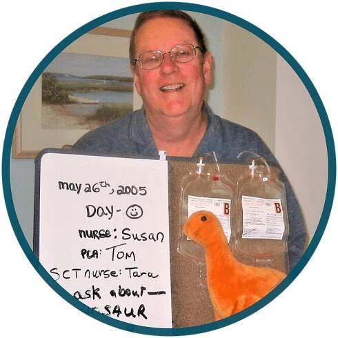 Bill with his signature Dinosaur during his hospital stay