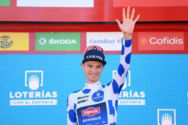 TOMARES SPAIN  SEPTEMBER 06 Jay Vine of Australia and Team AlpecinDeceuninck  Polka Dot Mountain Jersey celebrates at podium during the 77th Tour of Spain 2022 Stage 16 a 1894km stage from Sanlcar de Barrameda to Tomares  LaVuelta22  WorldTour  on September 06 2022 in Tomares Spain Photo by Justin SetterfieldGetty Images