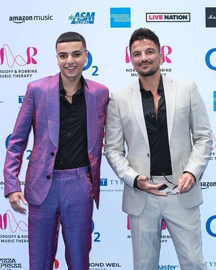 Junior and Peter Andre at the 2023 Nordoff and Robbins Silver Clef Awards.