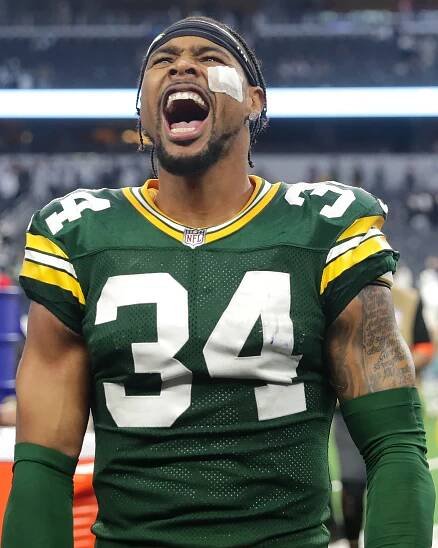 Green Bay Packers safety Jonathan Owens (34) celebrating after winning the wild card playoff game against the Dallas Cowboys at AT&T Stadium, 2024