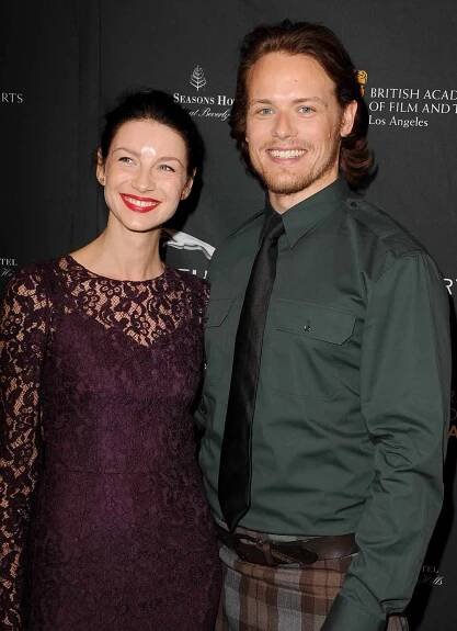 Actress Caitriona Balfe (L) and actor Sam Heughan arrive at the BAFTA Los Angeles Awards Season Tea Party at the Four Seasons Hotel Los Angeles at Beverly Hills on January 11, 2014 in Beverly Hills, California