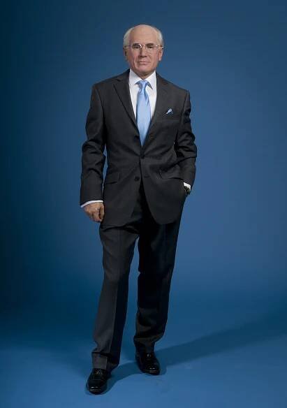 john howard wax work in blue tie